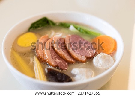 Duck meat soup noodles bowl