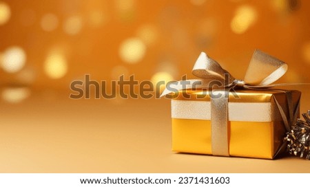  a gift on a golden background with ribbons and decorations
