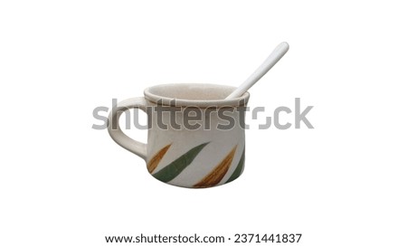 Coffee mug and coffee spoon with white background