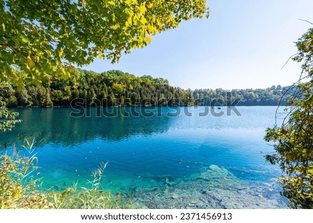 Discover Green Lakes State Park: Syracuse, NY's natural treasure, with emerald lakes and picturesque trails, perfect for outdoor enthusiasts and nature admirers. Royalty-Free Stock Photo #2371456913