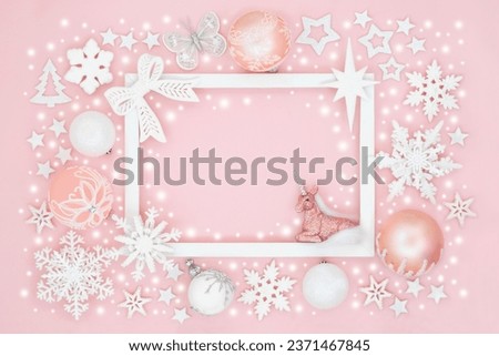 Mythical unicorn north pole Christmas background border with baubles, snow and white frame. Festive magical fantasy design for greeting card, label, gift tag, winter on pink.