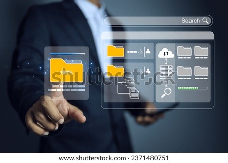 Businessman pointing on document folder using smart phone access database document management in online documentation external servers and digital file on cloud storage sharing system.