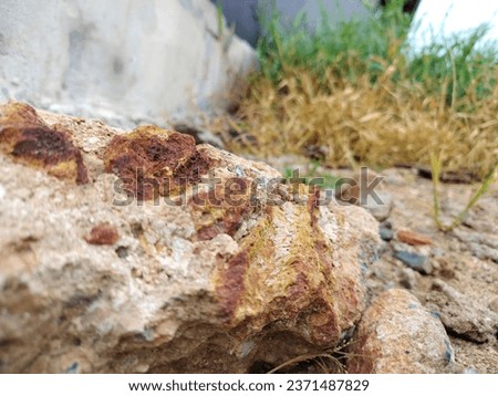 Pictures of rocks and patterns that occur naturally, orange, grey, red, white.