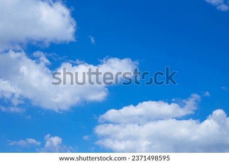 Blue sky with clouds. Natural background for screensaver, text, template.