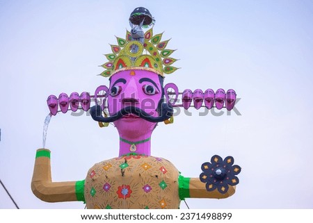 Handmade colorful Ravan sculpture during Dussehra festival in India.  Royalty-Free Stock Photo #2371498899
