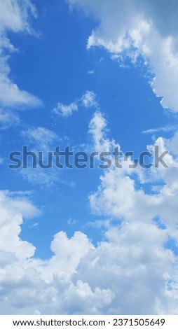 A potrait picture of sky with beautiful clouds