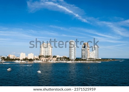 The view of a Main Channel and Miami Beach skyline under the picturesque blue sky (Florida).