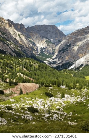 Valley Val Travenanzes and path way rock face in Tofane gruppe, Alps Dolomites mountains, Fanes national park, Italy Royalty-Free Stock Photo #2371531481