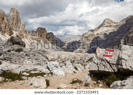 View from forcella Travenanzes, hiking trail number 401 Valley Val Travenanzes and rock face in Tofane gruppe, Alps Dolomites mountains, Fanes national park, Italy Royalty-Free Stock Photo #2371533491