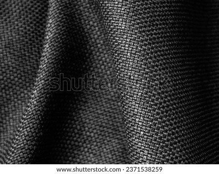 Dark dense fabric material background, material for sewing curtains
