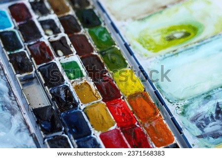 palette of colorful watercolor paints
