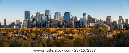 View of Calgary's modern skyline on a beautiful autumn evening. Royalty-Free Stock Photo #2371572389