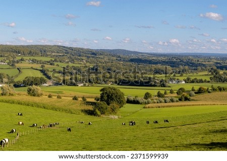 Summer landscape view, Hilly countryside of Zuid-Limburg with small village on the hillside, farmland and forest, Epen is a village in the southern part of the Dutch province of Limburg, Netherlands. Royalty-Free Stock Photo #2371599939