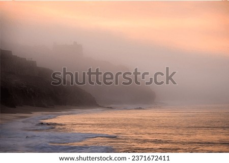 Early morning image of mist rolling across the cliffs