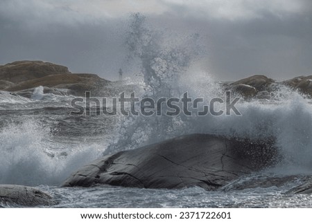 Stormy sea at a lighthouse