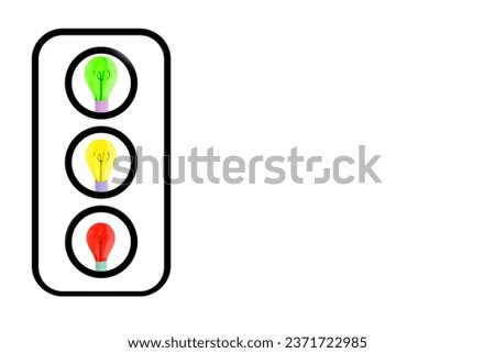 Imitation of Traffic Light on white background. Traffic Light consisting of paper bulbs
