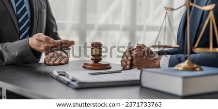 Consultation and conference of lawyers and professional businessman working and discussion having at law firm in office. Concepts of law, Judge gavel with scales of justice. Royalty-Free Stock Photo #2371733763