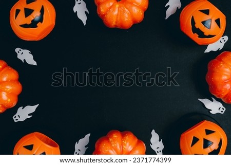 Mystery Halloween background with pumpkins. Halloween flat lay. Halloween top view. copy space.