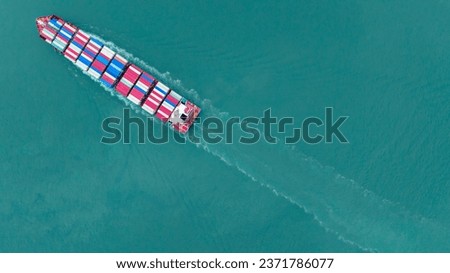 top view cargo ship carrying container and running for export goods from cargo yard port to custom ocean concept freight shipping by ship 