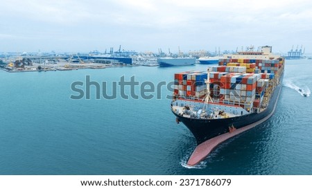 aerial front of cargo ship carrying container and running for export goods from cargo yard port to custom ocean concept freight shipping by ship 