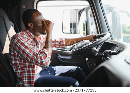 Truck driver gets angry while driving. Royalty-Free Stock Photo #2371797233