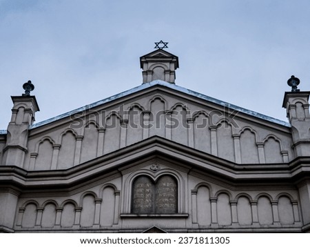 Tempel Synagogue is a synagogue in the Kazimierz district of Krakow, Poland. Overcast weather. Cloudy. Royalty-Free Stock Photo #2371811305