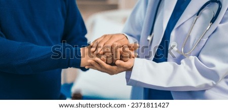Elderly man engages in thoughtful discussion with compassionate asian people female doctor, addressing health agenda and medical concerns, exemplifying importance of patient-centered care. Royalty-Free Stock Photo #2371811427