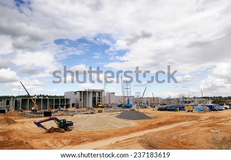 Construction Site, construction machinery, bulldozer, excavation, factory Royalty-Free Stock Photo #237183619