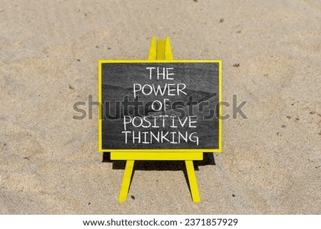 Positive thinking symbol. Concept words The power of positive thinking on beautiful black chalkboard. Beautiful sea sand beach background. Business, motivational positive thinking concept. Copy space.