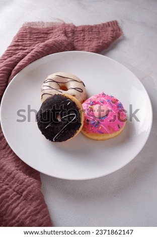 Various kinds of donuts which are children's favorite food. Isolated. Copy space. Menu. Flatlay. Food Photography