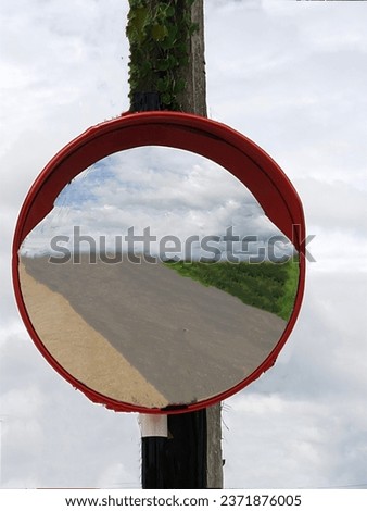 red curved glass Traffic materials commonly used in rural Thailand Royalty-Free Stock Photo #2371876005