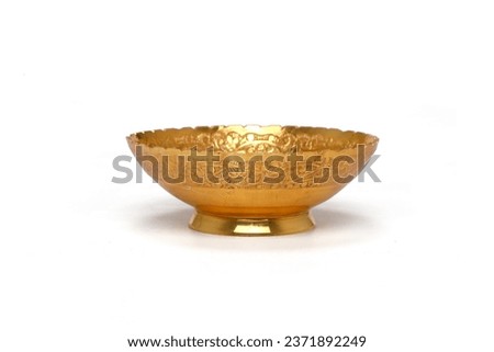 metal bowl,Brass bowl isolated in white background,Thai Golden tray with pedestal for put something.Old antique vintage gold, brass bowl on white background,Fine metal cup sugar bowl isolated on white Royalty-Free Stock Photo #2371892249