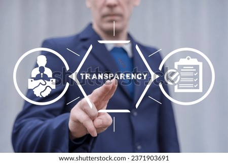 Man using virtual touch screen presses word: TRANSPARENCY. Concept of business transparency. Honest and clean company. Financial and economical stats sharing, publication and presentation. Royalty-Free Stock Photo #2371903691