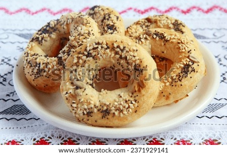 Bagels with sesame and poppy seeds on the plate