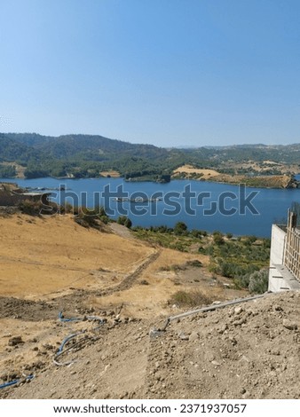 mobile Photo panoramic view of the dam lake