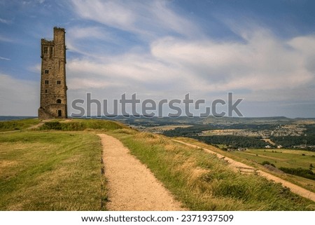Landscape view of Victorian commemoration tower on Castle Hill, Huddersfield, West Yorkshire, England. Royalty-Free Stock Photo #2371937509