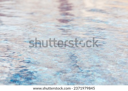 Fluid Symmetry: Abstract Patterns on Water's Surface