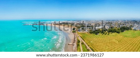 Timaru industrial port town on Pacific East coast of South Island in New Zealand - scenic aerial panorama. Royalty-Free Stock Photo #2371986127