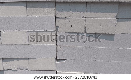 Piles of concrete blocks in a construction site