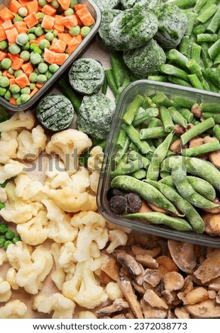 A set of foods for the winter. Various of frozen vegetables and berries. Top view.
