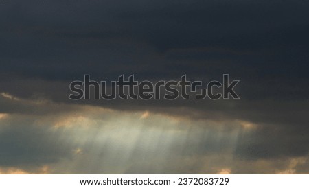 Dark sky with nimbostratus clouds, during a raining episode Royalty-Free Stock Photo #2372083729