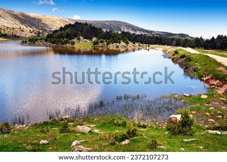 Long Lagoon in the Sierra de Neila. Burgos . Spain. Royalty-Free Stock Photo #2372107273
