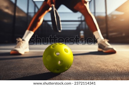 Low angle view of a pickleball game Royalty-Free Stock Photo #2372114341