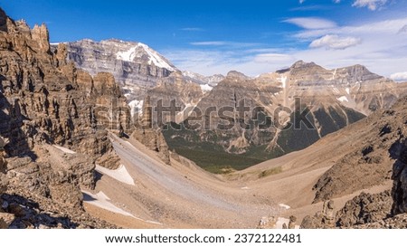 View of the Paradise Valley on the other side of the Sentinel Pass and Grand Sentinel that is an obelisk rock tower on the back side of Pinnacle Mountain, in Banff National Park, Alberta, Canada Royalty-Free Stock Photo #2372122481