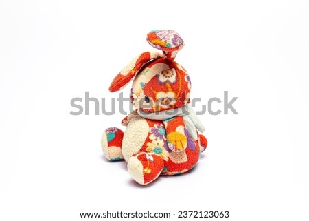 Rabbit cloth doll on white background