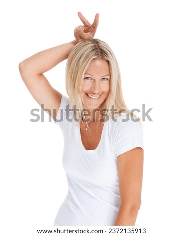 Woman, bunny ears or finger fun studio portrait for happy personality, natural beauty or emoji. Female model person, t-shirt or rabbit hand gesture smile or white background comedy, joke or funny
