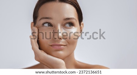 Beauty Photo of Woman with Clean and Healthy Skin Touching Her Face