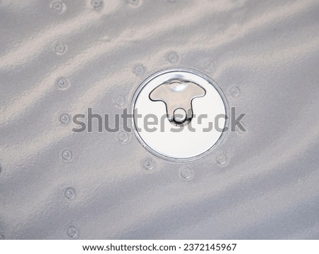 Detail of smalll airplane body. Ultralight plane or drone,  aluminum cover with rivets, the painted surface, Airplane airframe close-up Royalty-Free Stock Photo #2372145967