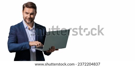 Business man working on laptop in studio. Man checking email on laptop, writing message in social network, using internet, searching information on laptops. Banner for header, copy space. Wide poster.