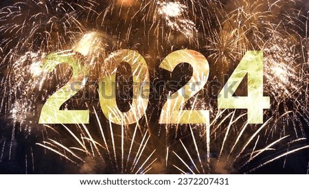 New Year's Eve Fireworks Celebrate Real Fireworks Background. Firework Display, abstract blur of real golden shining fireworks lights at night sky. Merry Christmas and Happy New Year 2024